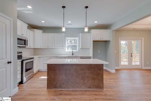 104 Pawleys Ct, Anderson, SC 29625 - kitchen featuring light wood-style floors, appliances with stainless steel finishes, and plenty of natural light