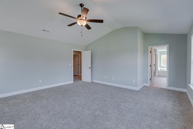 104 Pawleys Ct, Anderson, SC 29625 - empty room featuring a ceiling fan, baseboards, vaulted ceiling, and light carpet