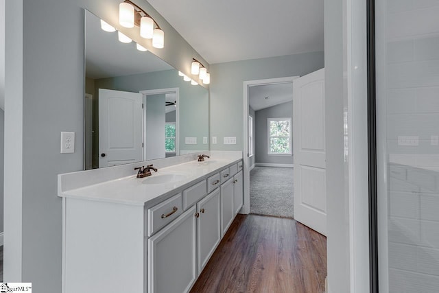 104 Pawleys Ct, Anderson, SC 29625 - full bathroom featuring double vanity, wood finished floors, vaulted ceiling, and a sink