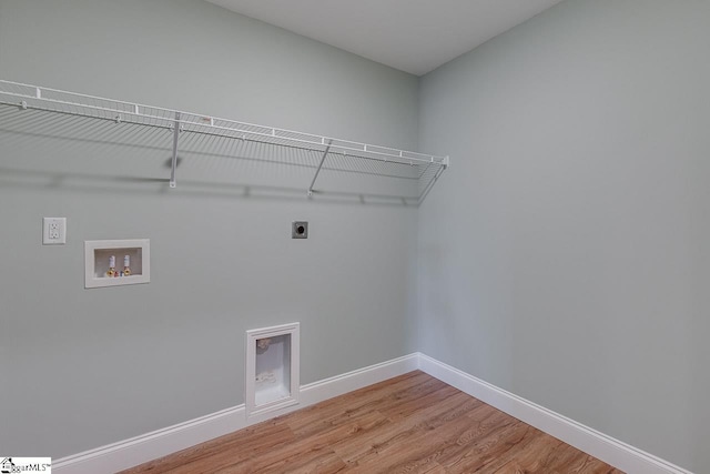 104 Pawleys Ct, Anderson, SC 29625 - clothes washing area featuring hookup for an electric dryer, laundry area, light wood-type flooring, hookup for a washing machine, and baseboards