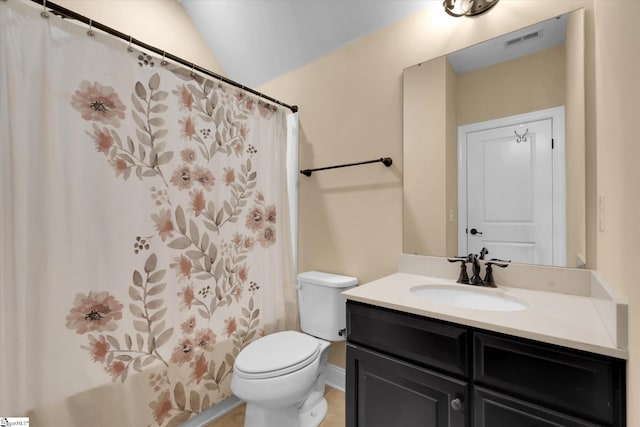 bathroom with vaulted ceiling, toilet, curtained shower, vanity, and visible vents