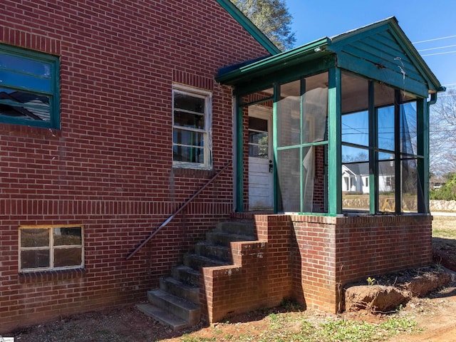 2006 E N St, Greenville, SC 29607 - doorway to property featuring brick siding