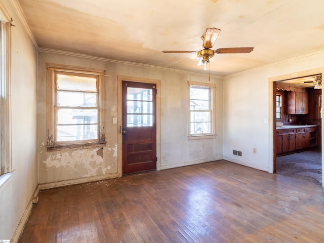 2006 E N St, Greenville, SC 29607 - foyer featuring ornamental molding, wood-type flooring, baseboards, visible vents, and a ceiling fan