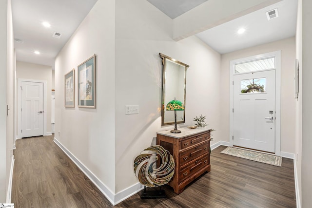 entrance foyer featuring dark wood finished floors, visible vents, recessed lighting, and baseboards