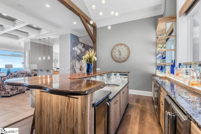 400 Stony Rd, Landrum, SC 29356 - kitchen featuring beamed ceiling, a kitchen breakfast bar, crown molding, and a sink
