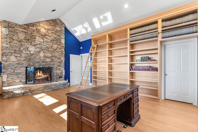 400 Stony Rd, Landrum, SC 29356 - office featuring light wood-type flooring, a stone fireplace, and lofted ceiling