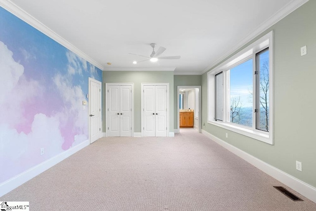 400 Stony Rd, Landrum, SC 29356 - unfurnished bedroom featuring visible vents, multiple closets, and baseboards
