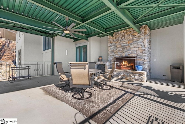 400 Stony Rd, Landrum, SC 29356 - view of patio with a ceiling fan and an outdoor stone fireplace