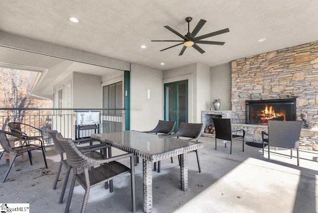 400 Stony Rd, Landrum, SC 29356 - view of patio / terrace with outdoor dining area and an outdoor stone fireplace