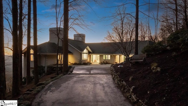 400 Stony Rd, Landrum, SC 29356 - view of front facade with driveway and a chimney