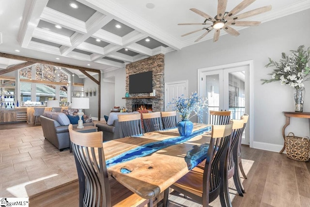 400 Stony Rd, Landrum, SC 29356 - dining area featuring crown molding, baseboards, beam ceiling, a fireplace, and a ceiling fan