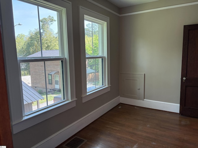 305 E Cherokee St, Chesnee, SC 29323 - spare room featuring a wealth of natural light, visible vents, and dark wood-style flooring