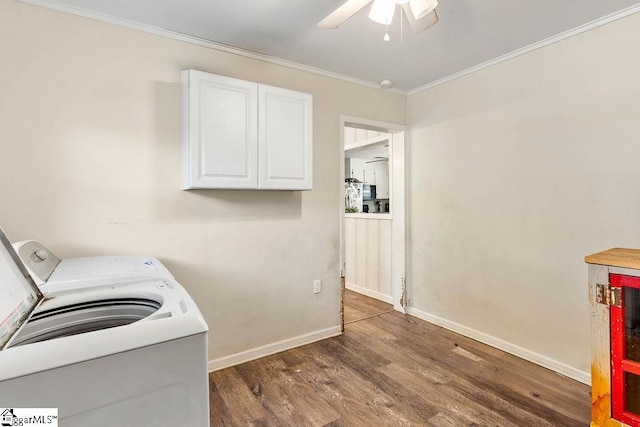clothes washing area with cabinet space, independent washer and dryer, ceiling fan, crown molding, and wood finished floors