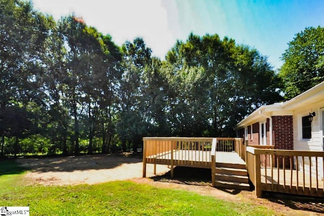 view of yard featuring a deck