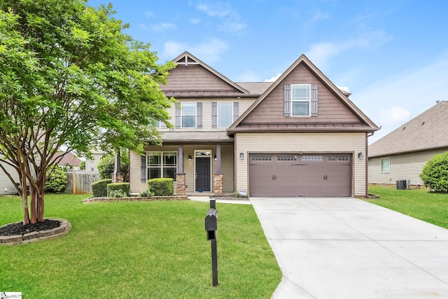 9 Dunsborough Dr, Simpsonville, SC 29680 - craftsman-style home featuring fence, concrete driveway, a front yard, and a garage