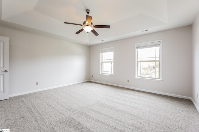 9 Dunsborough Dr, Simpsonville, SC 29680 - empty room featuring visible vents, a raised ceiling, and carpet floors