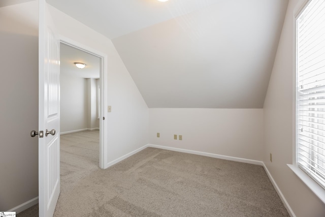 9 Dunsborough Dr, Simpsonville, SC 29680 - additional living space with carpet flooring, lofted ceiling, and baseboards