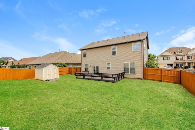 9 Dunsborough Dr, Simpsonville, SC 29680 - rear view of property featuring a storage shed, a yard, an outdoor structure, and a fenced backyard