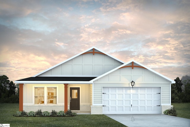 view of front facade with a front lawn, a garage, driveway, board and batten siding, and brick siding