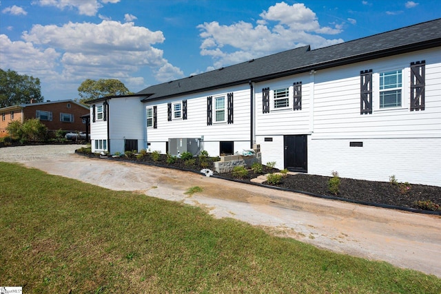 exterior space with a front lawn
