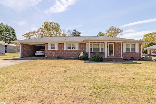 ranch-style house with crawl space, a carport, brick siding, a front lawn, and concrete driveway