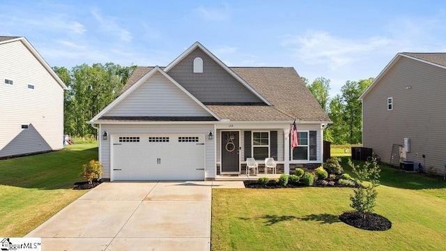 149 Bruinen Dr, Fountain Inn, SC 29644 - craftsman house with concrete driveway, a shingled roof, a front yard, a porch, and a garage