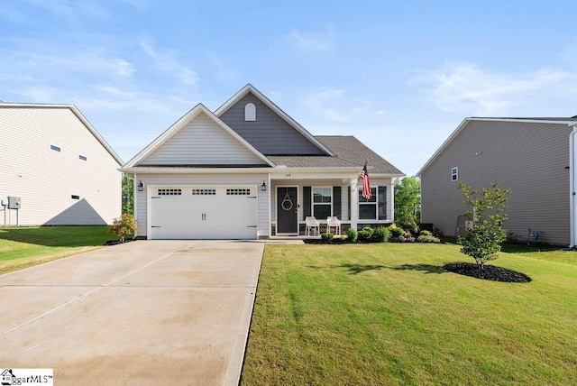 149 Bruinen Dr, Fountain Inn, SC 29644 - craftsman-style home featuring concrete driveway, a front yard, an attached garage, and covered porch