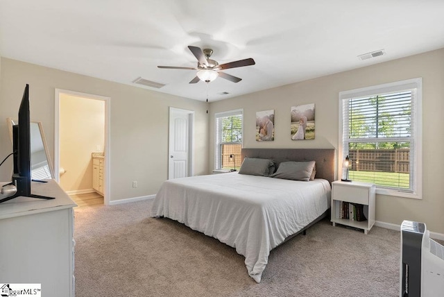 149 Bruinen Dr, Fountain Inn, SC 29644 - bedroom with baseboards, visible vents, a ceiling fan, and light carpet