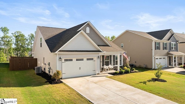 149 Bruinen Dr, Fountain Inn, SC 29644 - view of front facade featuring fence, a shingled roof, a front lawn, concrete driveway, and an attached garage