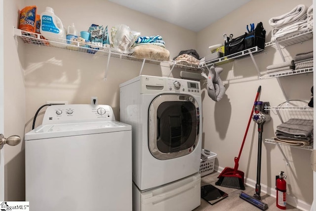 149 Bruinen Dr, Fountain Inn, SC 29644 - laundry room with separate washer and dryer, laundry area, and carpet flooring