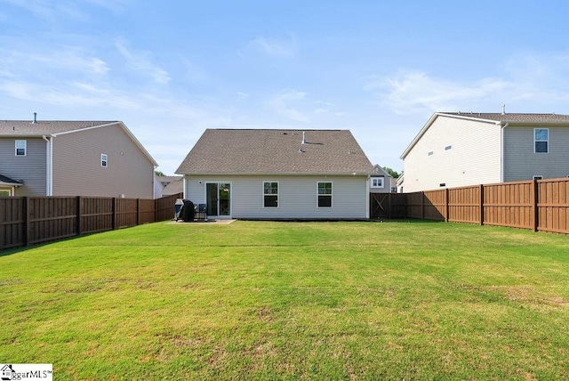 149 Bruinen Dr, Fountain Inn, SC 29644 - back of house with a lawn and a fenced backyard