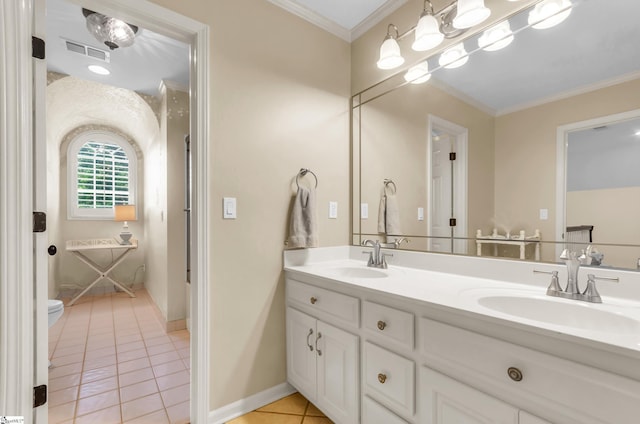 full bathroom featuring crown molding, tile patterned floors, visible vents, and a sink