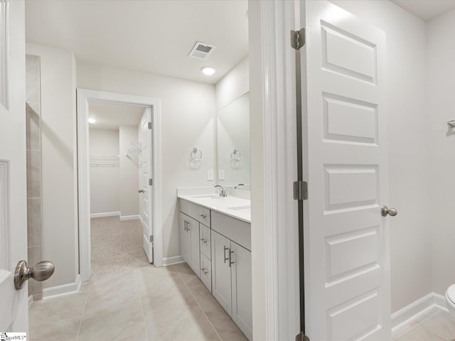 216 Merriweather Way, Spartanburg, SC 29302 - full bathroom with double vanity, a spacious closet, and tile patterned flooring