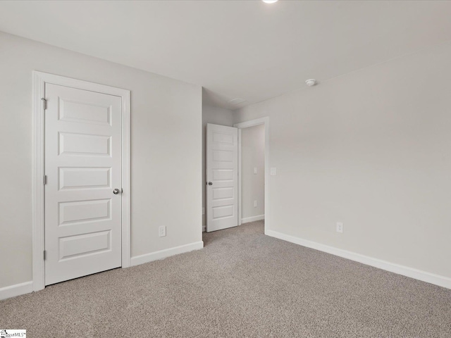 216 Merriweather Way, Spartanburg, SC 29302 - unfurnished bedroom featuring carpet flooring and baseboards