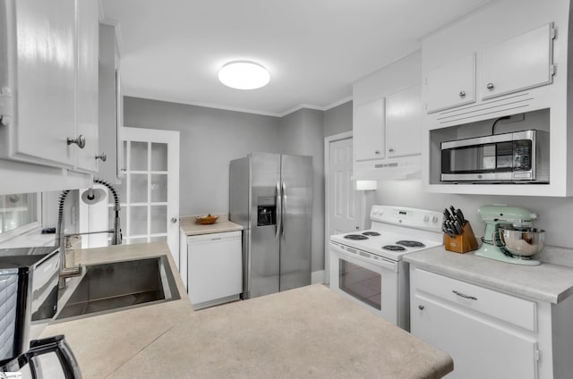 kitchen featuring white cabinets, appliances with stainless steel finishes, a sink, light countertops, and under cabinet range hood