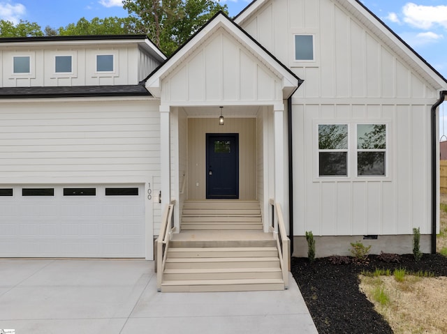 modern inspired farmhouse with board and batten siding, crawl space, concrete driveway, an attached garage, and a shingled roof