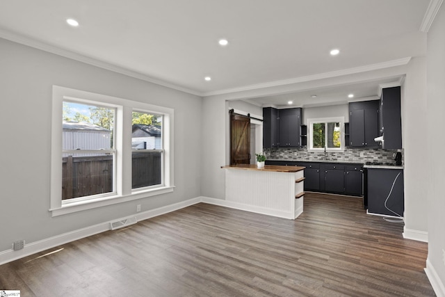 kitchen featuring visible vents, recessed lighting, dark wood-style flooring, and tasteful backsplash