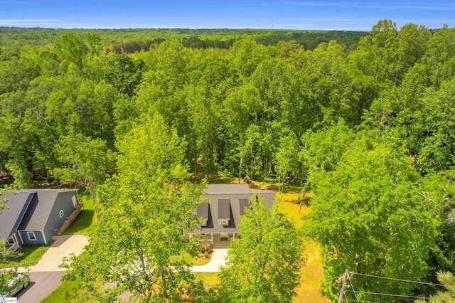 aerial view featuring a forest view