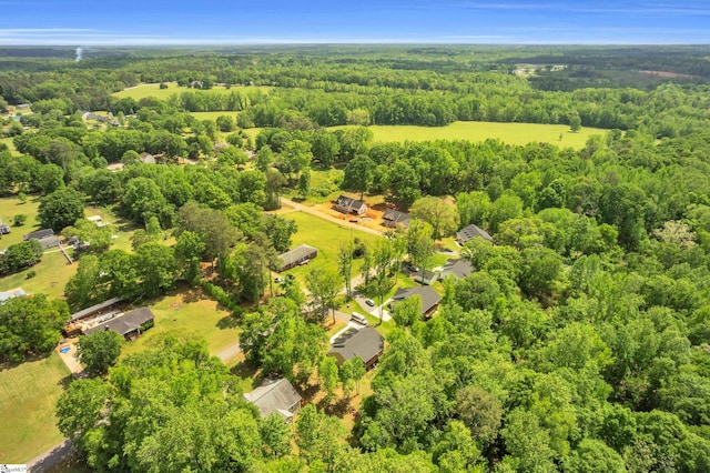 aerial view with a wooded view