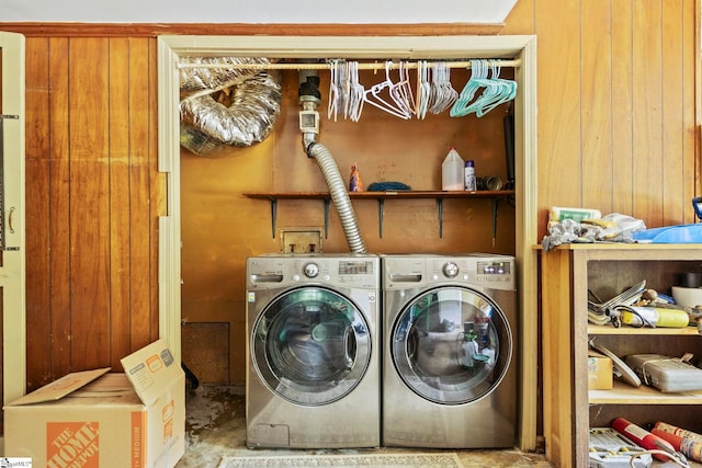 clothes washing area featuring laundry area and washer and dryer