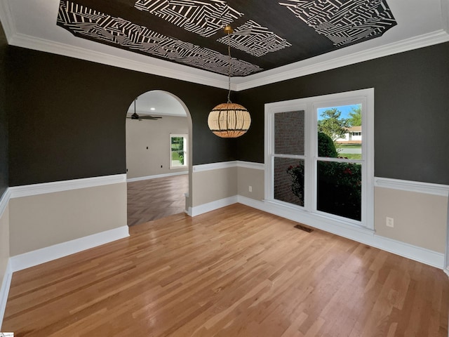 1611 Scuffletown Rd, Fountain Inn, SC 29644 - unfurnished dining area with arched walkways, baseboards, light wood-style flooring, and visible vents