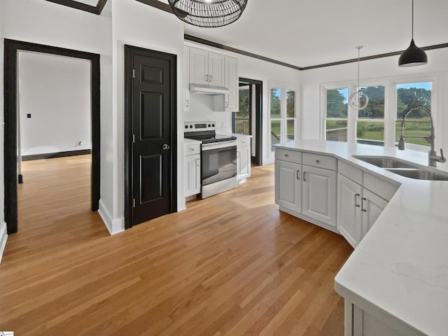 1611 Scuffletown Rd, Fountain Inn, SC 29644 - kitchen featuring hanging light fixtures, stainless steel electric range, white cabinetry, a sink, and light wood-style flooring