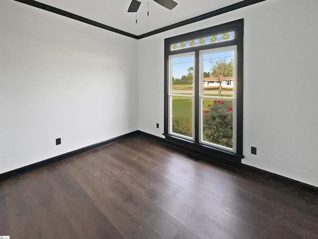 1611 Scuffletown Rd, Fountain Inn, SC 29644 - spare room with baseboards, ceiling fan, and dark wood finished floors