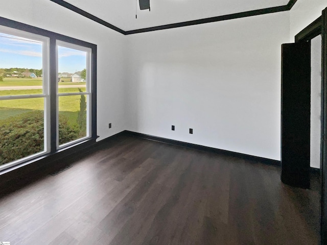 1611 Scuffletown Rd, Fountain Inn, SC 29644 - spare room featuring baseboards, a ceiling fan, dark wood-style flooring, and visible vents