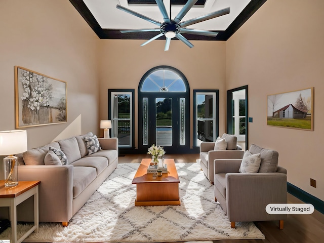 1611 Scuffletown Rd, Fountain Inn, SC 29644 - living area featuring baseboards, a ceiling fan, a towering ceiling, and wood finished floors