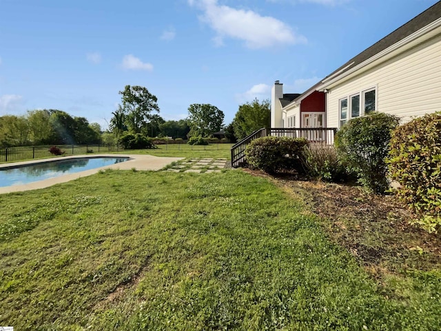 1611 Scuffletown Rd, Fountain Inn, SC 29644 - view of yard with fence, a wooden deck, and a fenced in pool