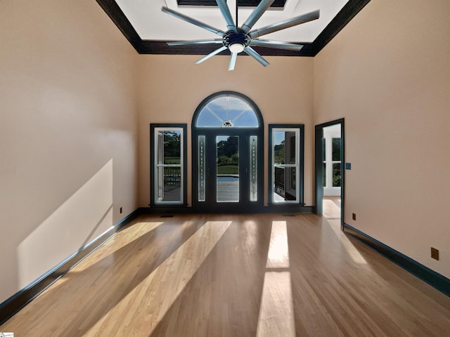 1611 Scuffletown Rd, Fountain Inn, SC 29644 - unfurnished room with baseboards, ceiling fan, beamed ceiling, and wood finished floors