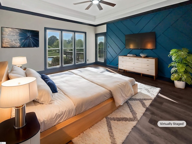 1611 Scuffletown Rd, Fountain Inn, SC 29644 - bedroom featuring baseboards, a ceiling fan, a tray ceiling, and wood finished floors