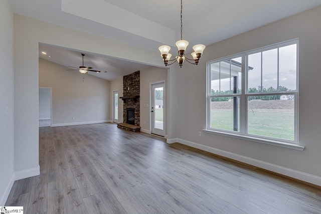 108 Walters Way, Pickens, SC 29671 - unfurnished living room featuring a chandelier, wood finished floors, vaulted ceiling, baseboards, and a fireplace