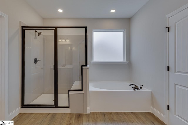 108 Walters Way, Pickens, SC 29671 - full bathroom featuring a garden tub, a stall shower, wood finished floors, and baseboards